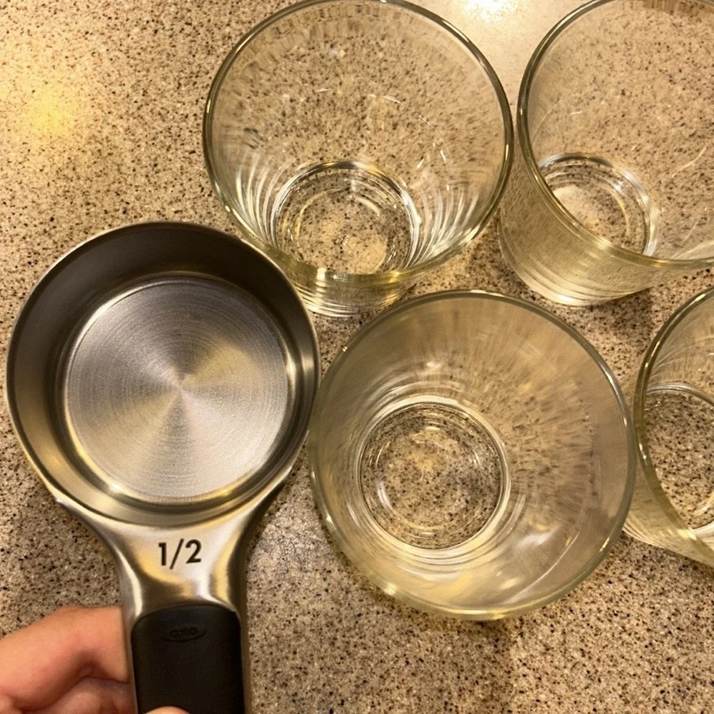 Four small water bottles